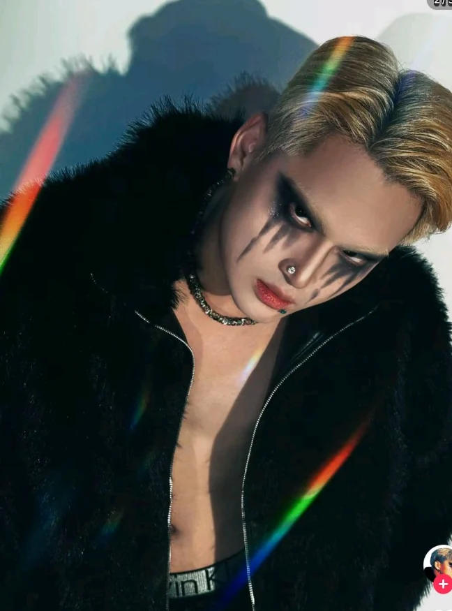 Meraki styled with blonde hair and artistic eye makeup