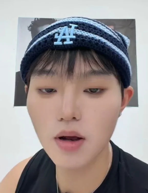 Sunny in a blue knit hat